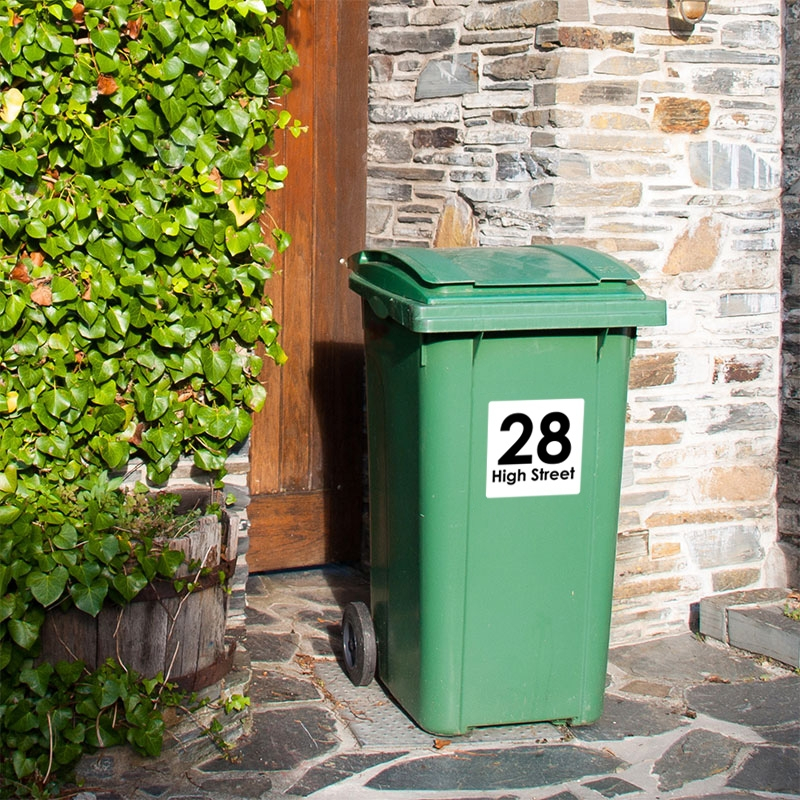Green wheelie bin with custom house number sticker